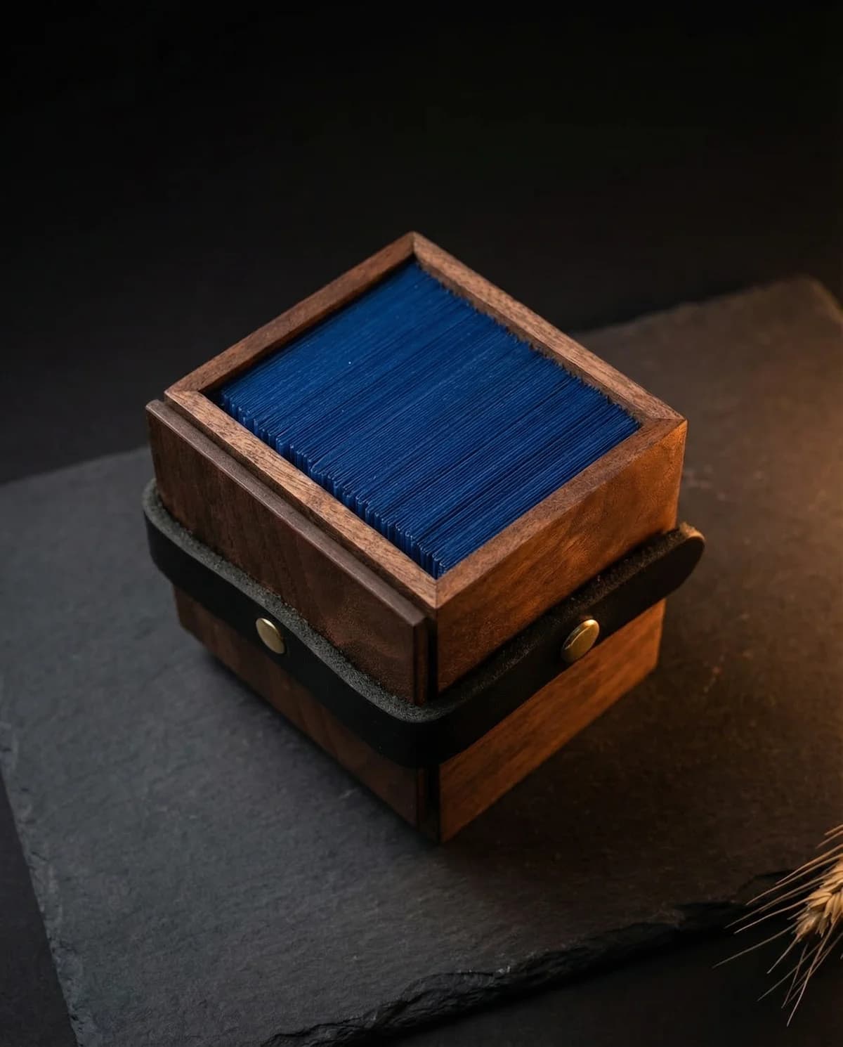 Open wooden commander deck box with 100+ double-sleeved Magic: The Gathering cards inside